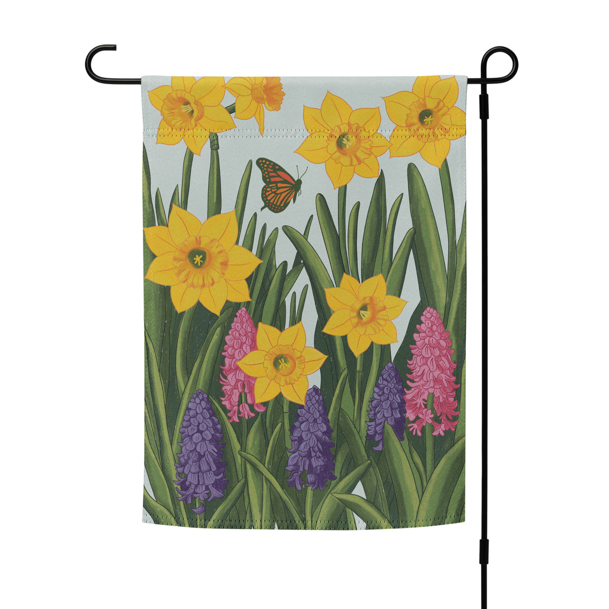 Hand-illustrated spring garden flag design with yellow daffodils, pink and purple hyacinths, green leaves, and a monarch butterfly on a soft blue background